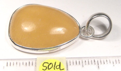 Foto Edelstein-Anhänger in Sterlingsilber: Orangencalcit