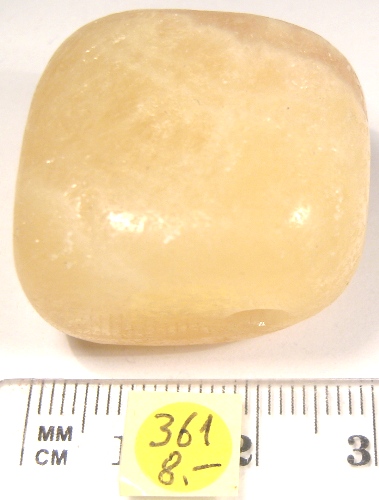 Foto Edelsteine: gebohrter Trommelstein Calcit