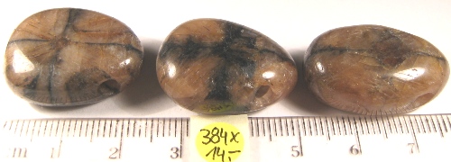 Foto Edelsteine: gebohrte Trommelsteine Chiastolith