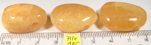 Foto Edelsteine: gebohrte Trommelsteine Orangencalcit