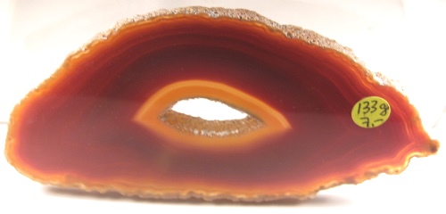 Foto Mineralien: rotbraune Achatscheibe mit Druse