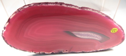 Foto Mineralien: pinkfarbene Achatscheibe poliert
